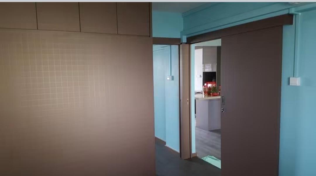 Hallway with wardrobe and kitchen view