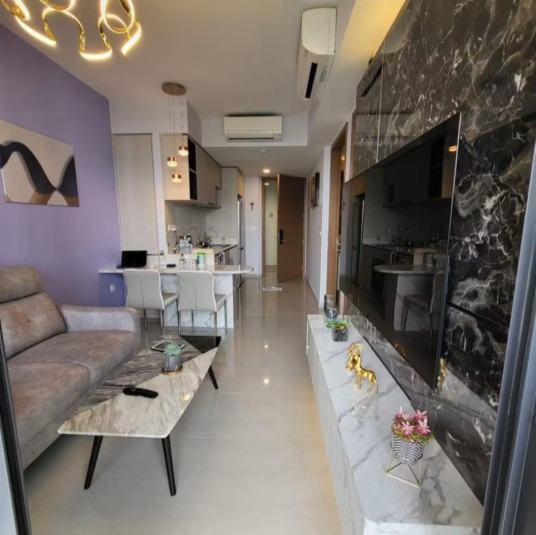 TV feature wall with balcony and city view