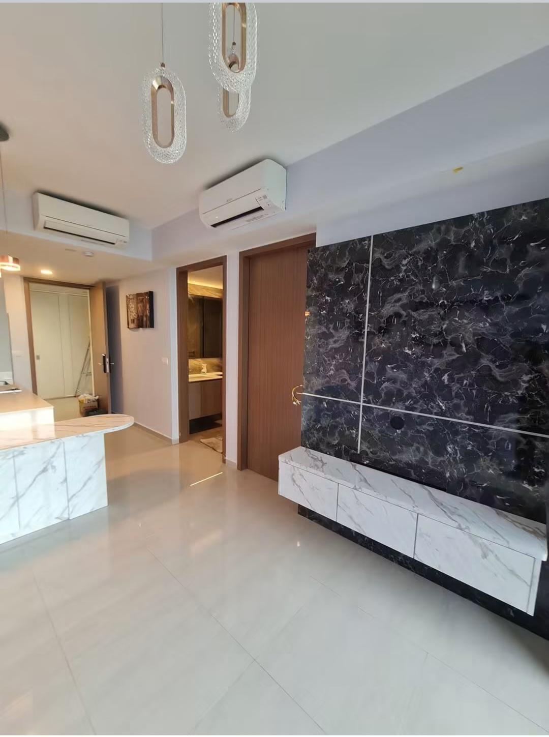 Hallway with framed art and balcony view