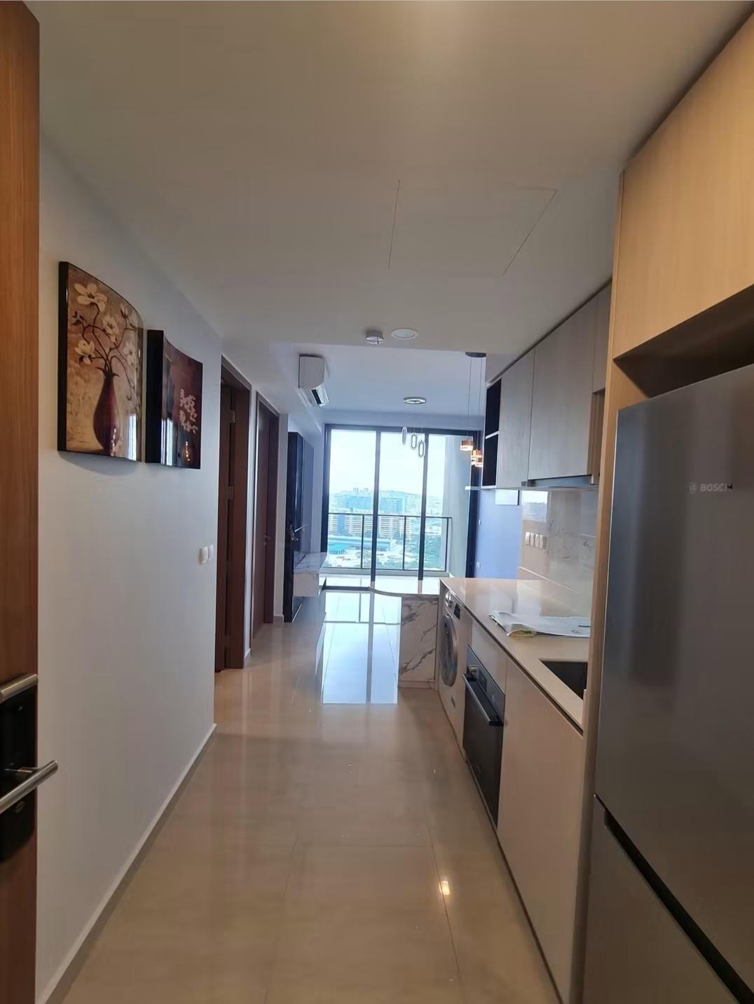 Kitchen with marble countertop and pendant lights