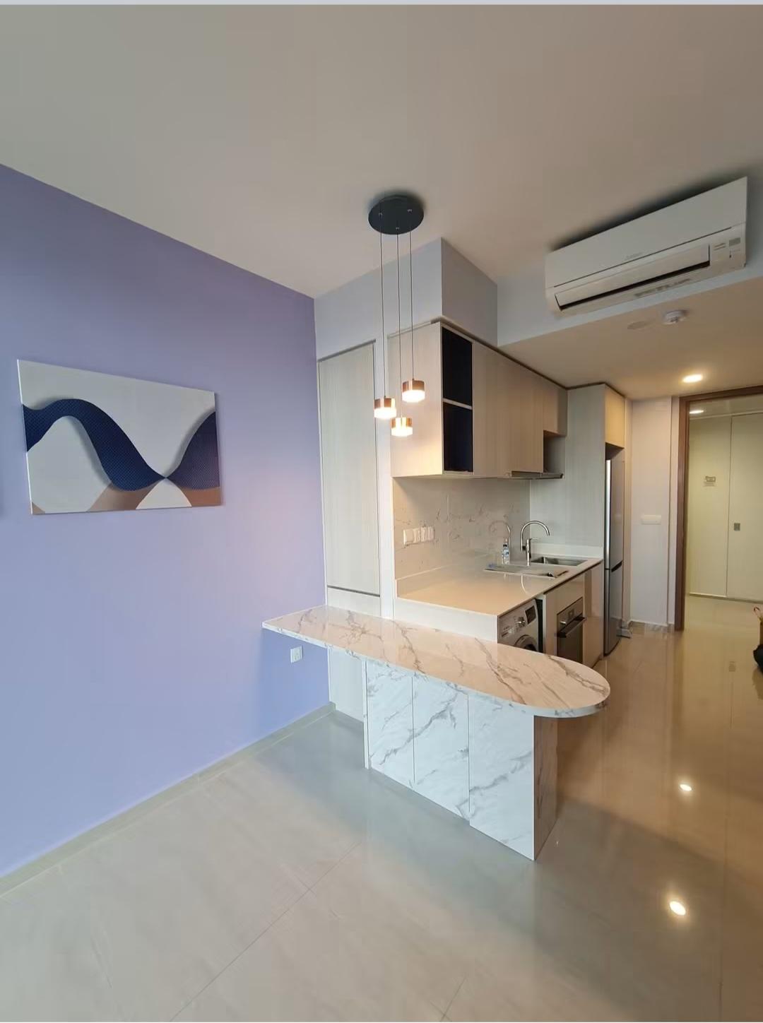 Marble TV feature wall with balcony doors