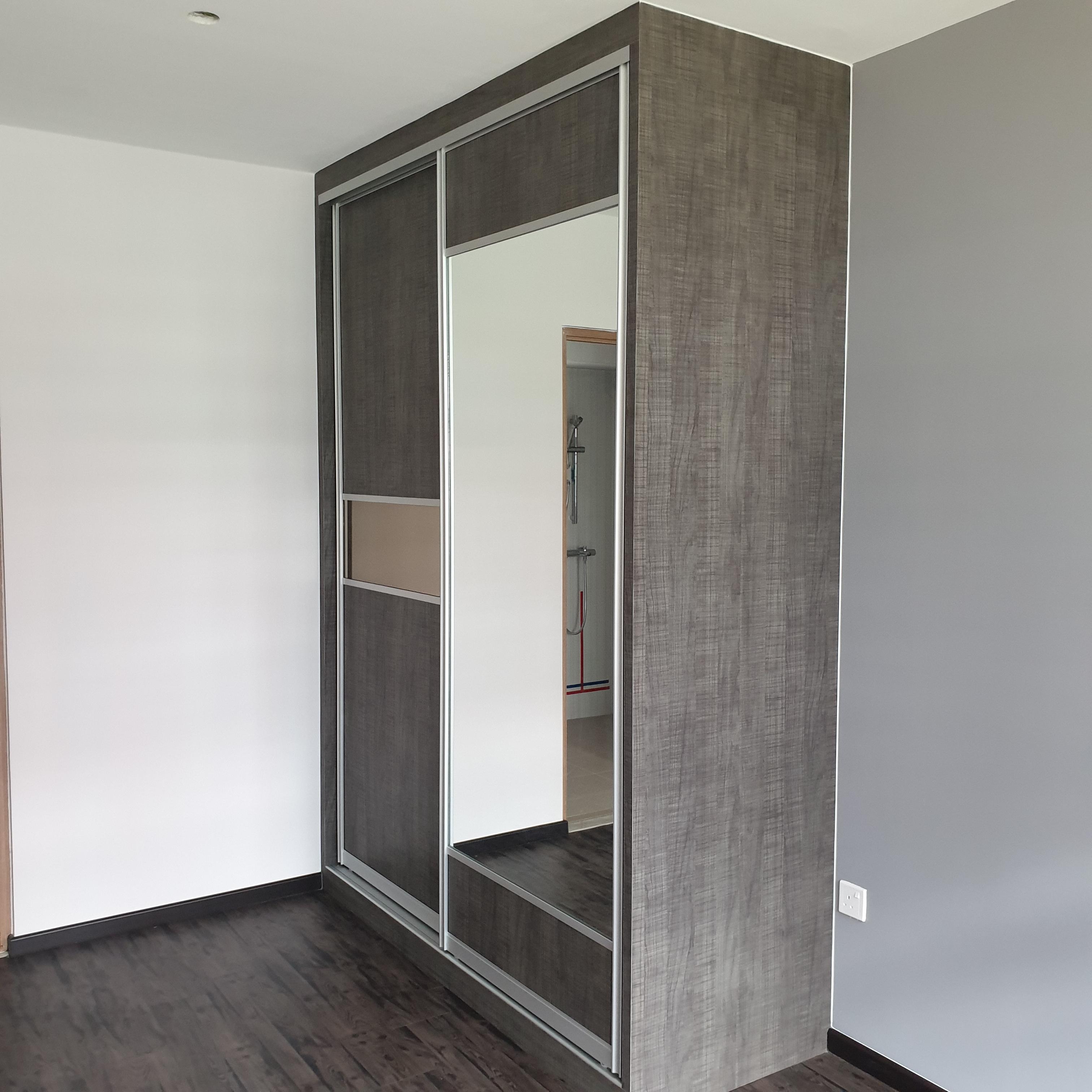 Corner wardrobe with mirrored sliding doors
