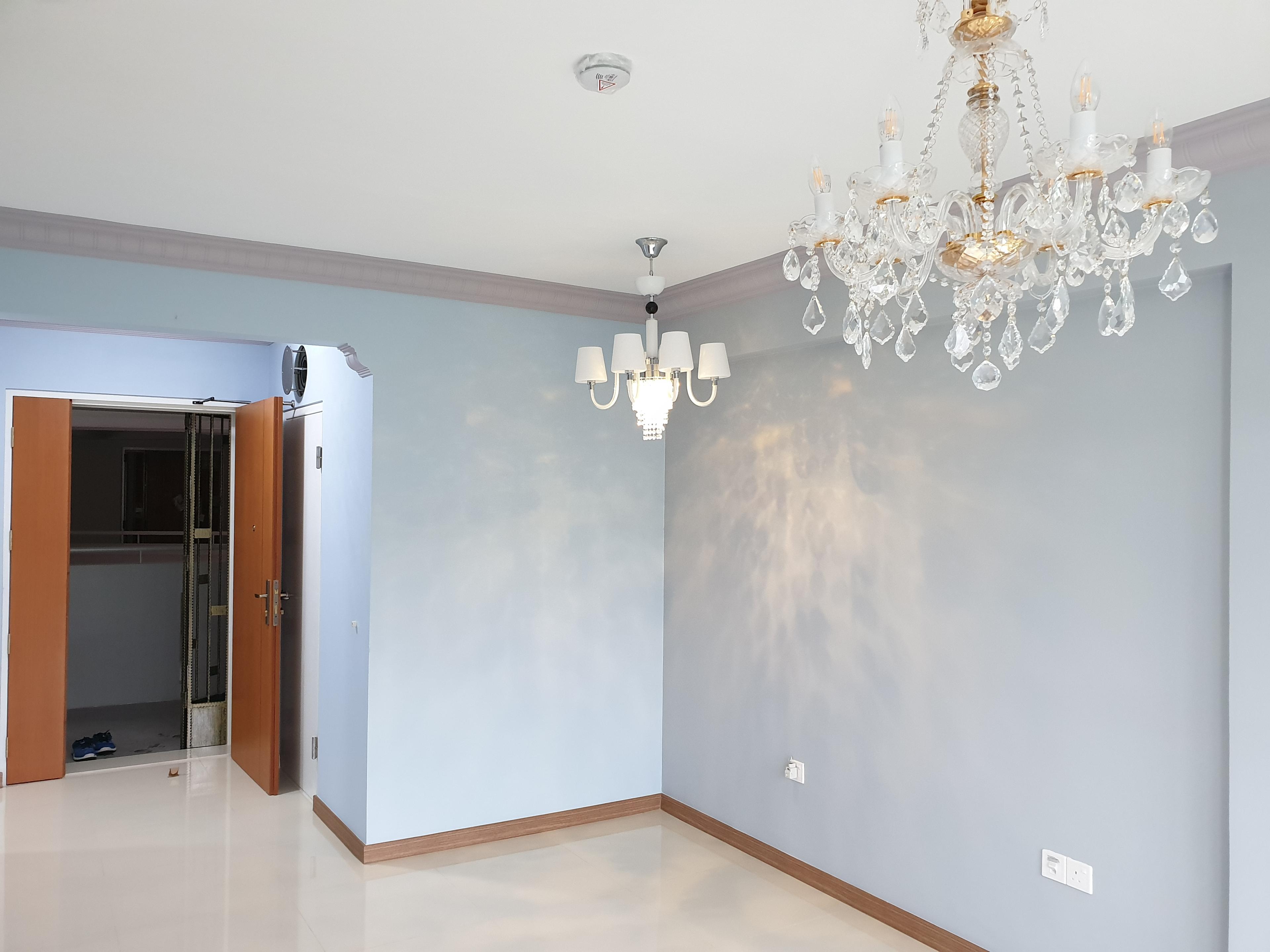Dining area with chandeliers and wardrobe