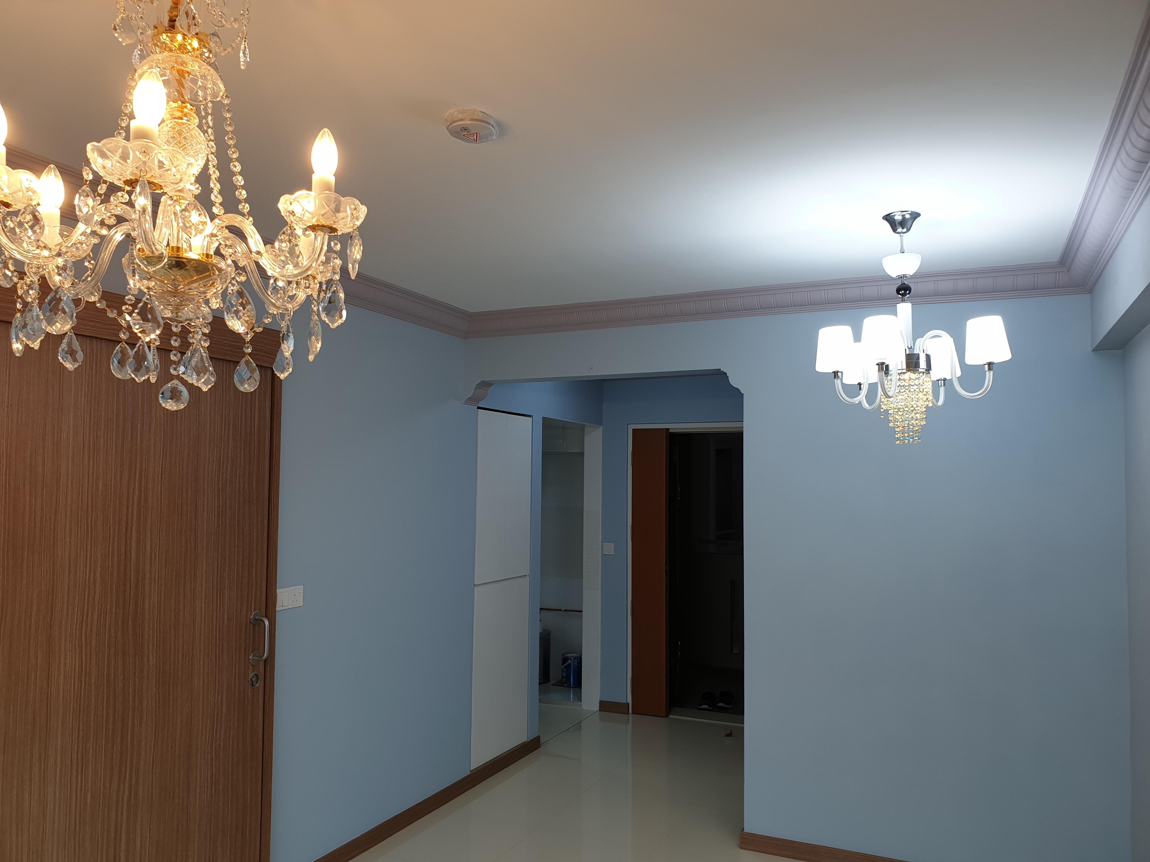 Living room with ornate chandelier