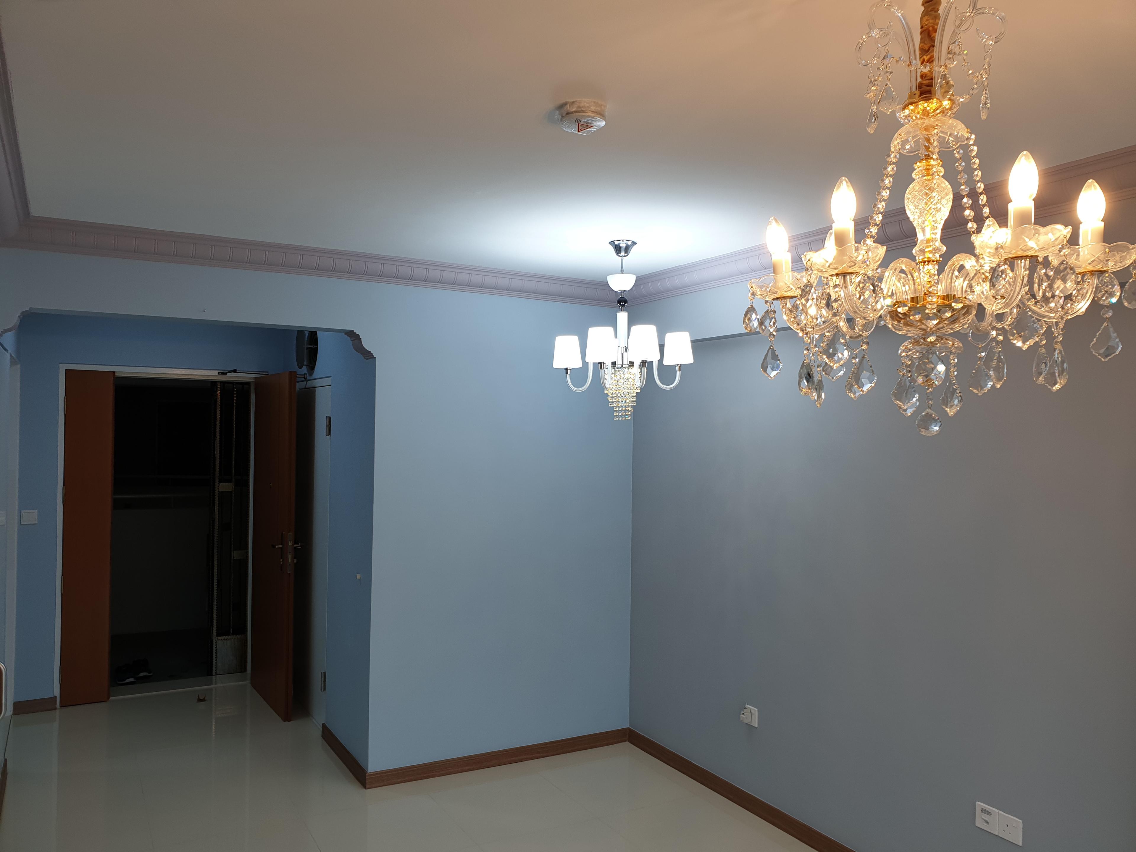 Living room with chandelier lighting