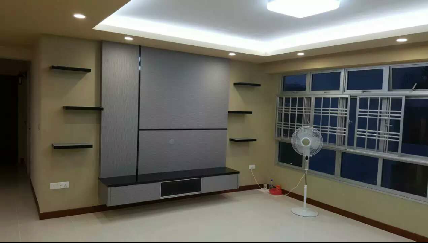 Living room with floating TV console and shelving