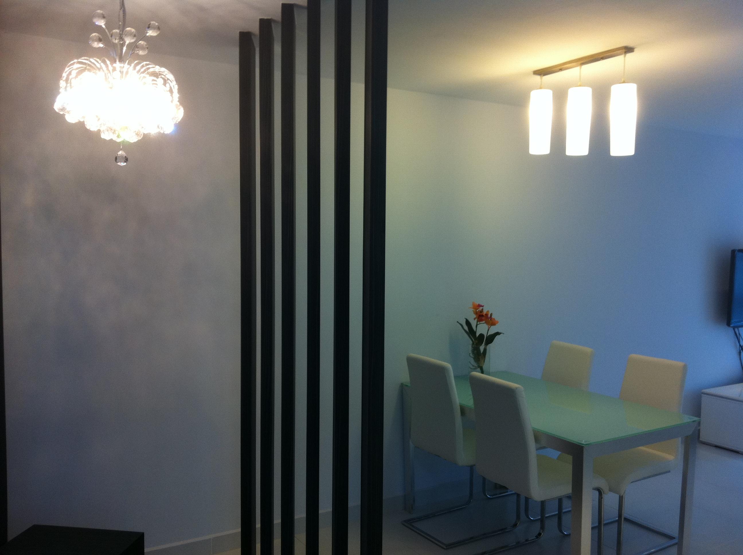 Dining and living area with feature partition