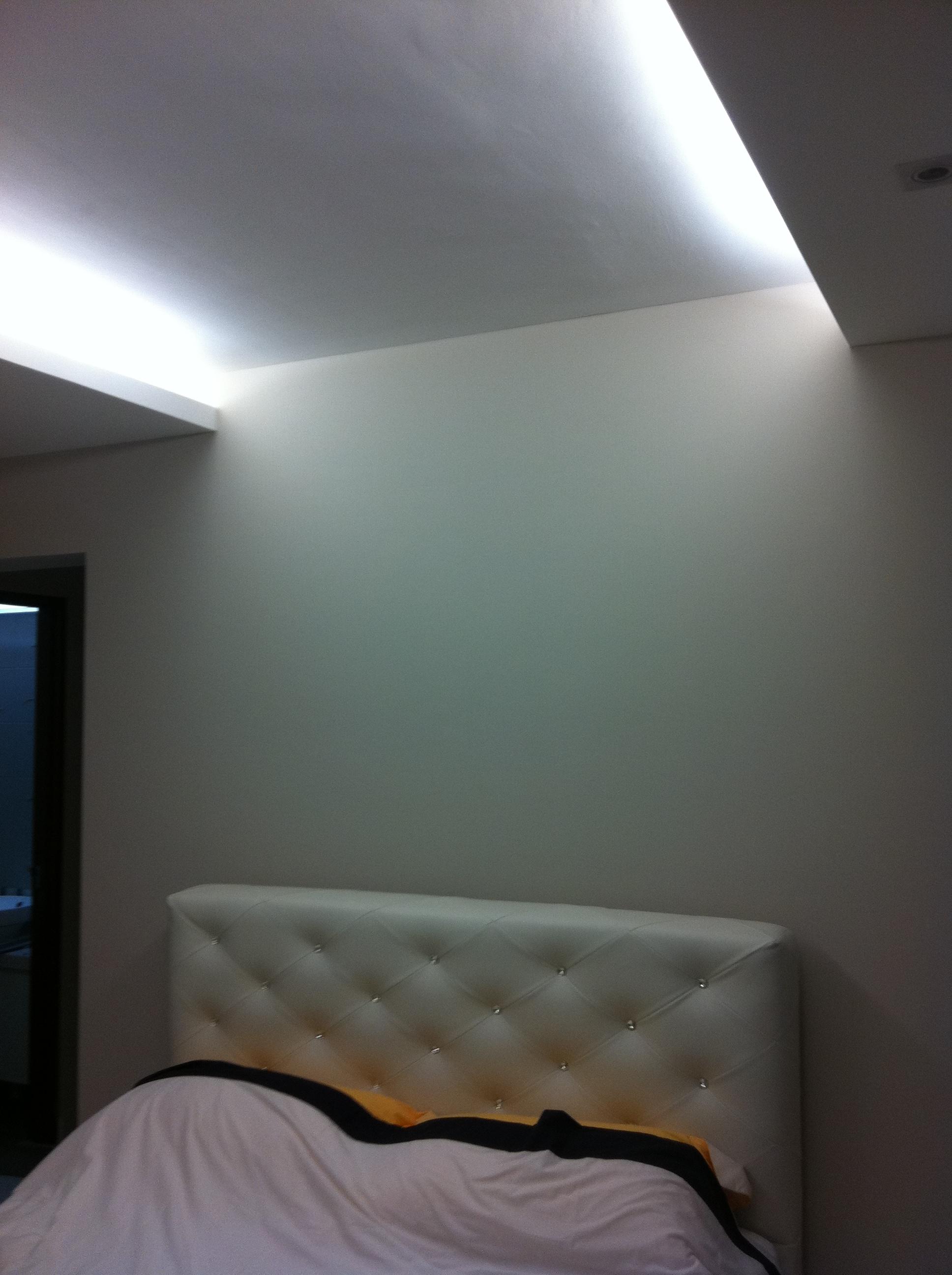 Window bay seating with curtains at night