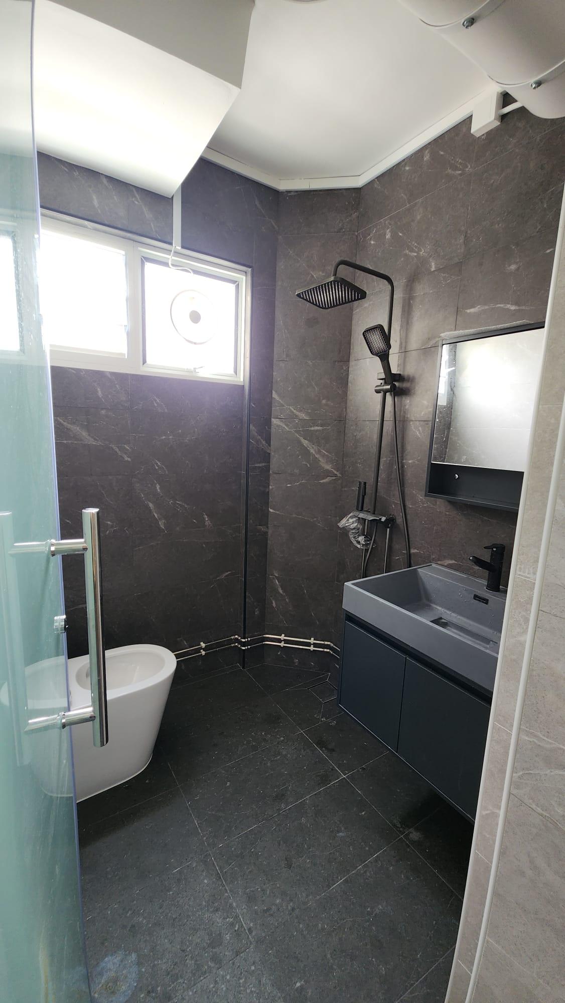 Bathroom vanity with rain shower and mirror cabinet