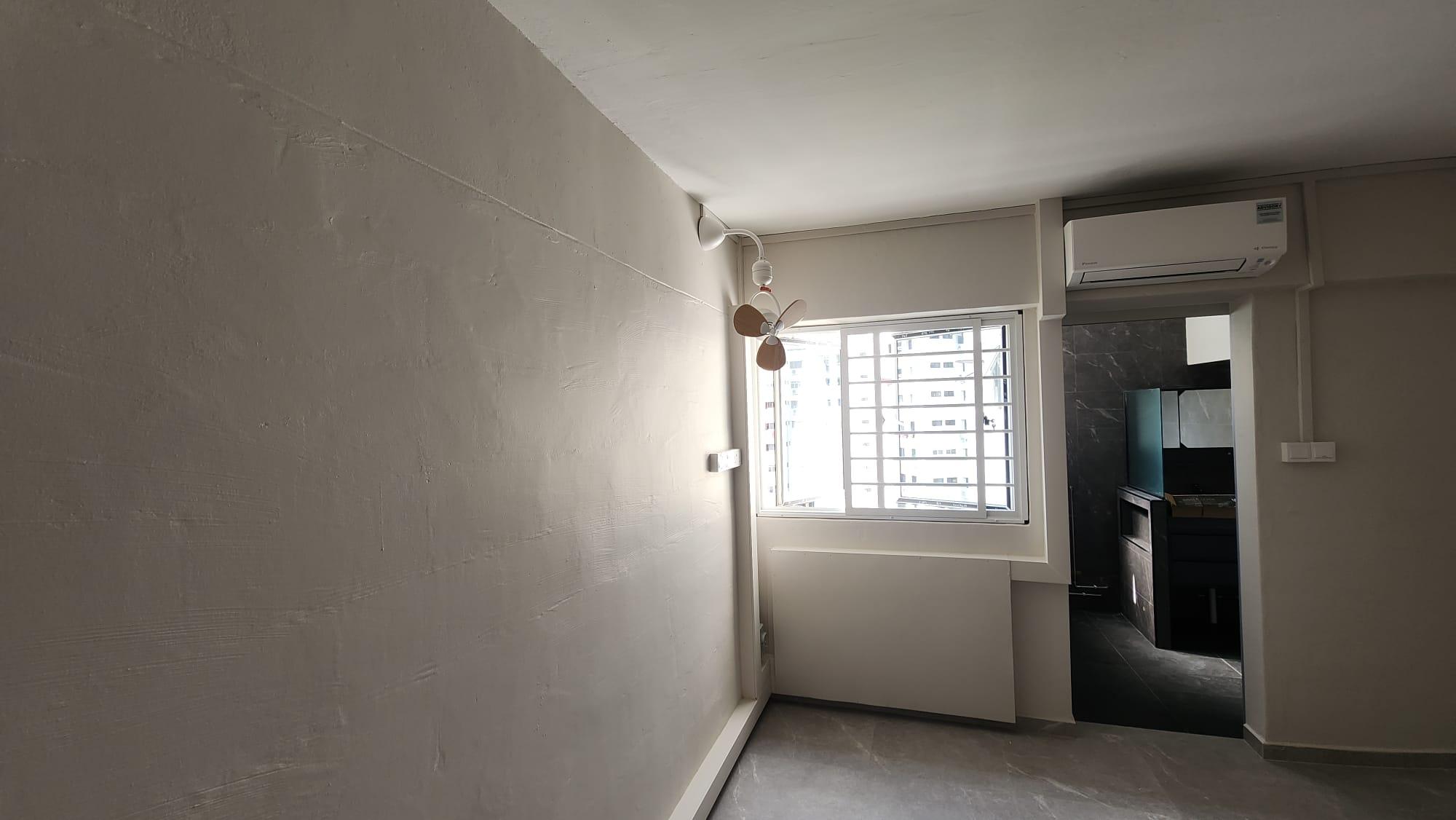 Bedroom corner with air-conditioning and hallway view