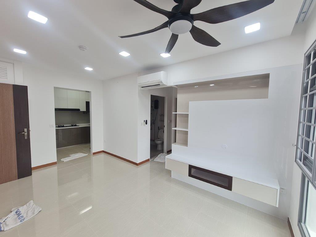 Living room with TV feature wall and kitchen view