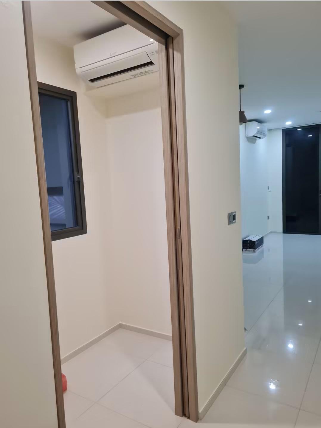 Hallway with air-conditioning and bedroom doorway