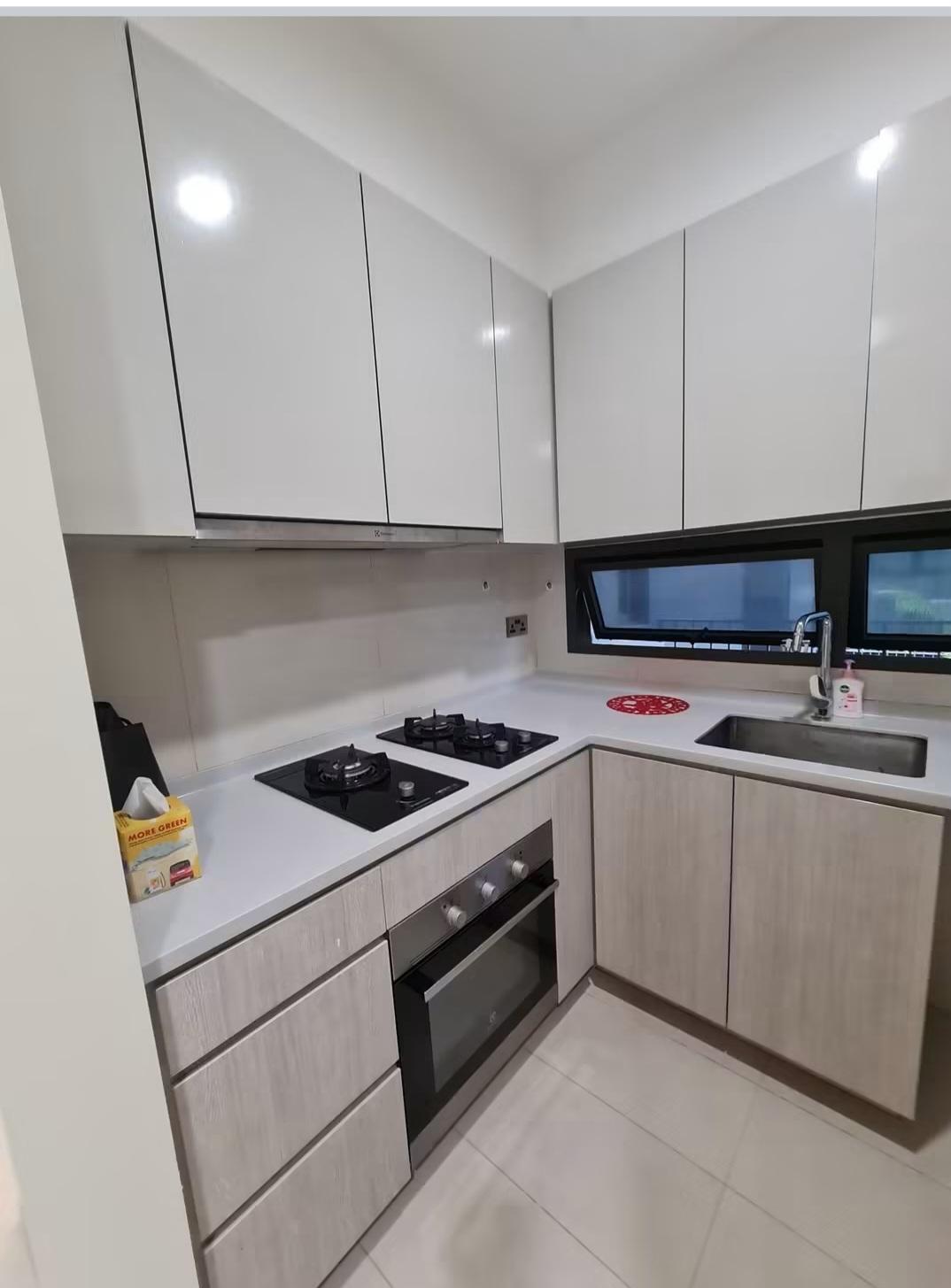 Kitchen with white cabinetry and gas hob